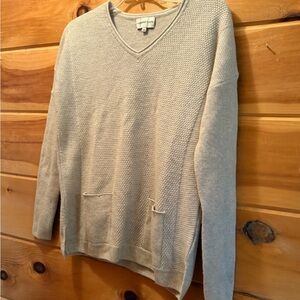 Cashmere V-Neck Sweater Soft Knit Relaxed Fit with front pockets.